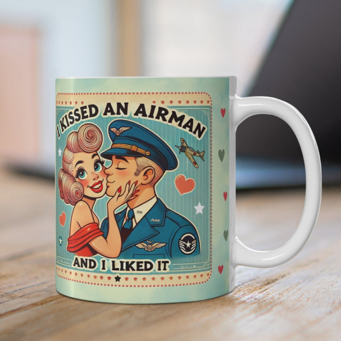 Retro 50s-style ceramic coffee mug with blonde lady and Airforce-themed 'I Kissed an Airman and I Liked It' design, perfect for military families.