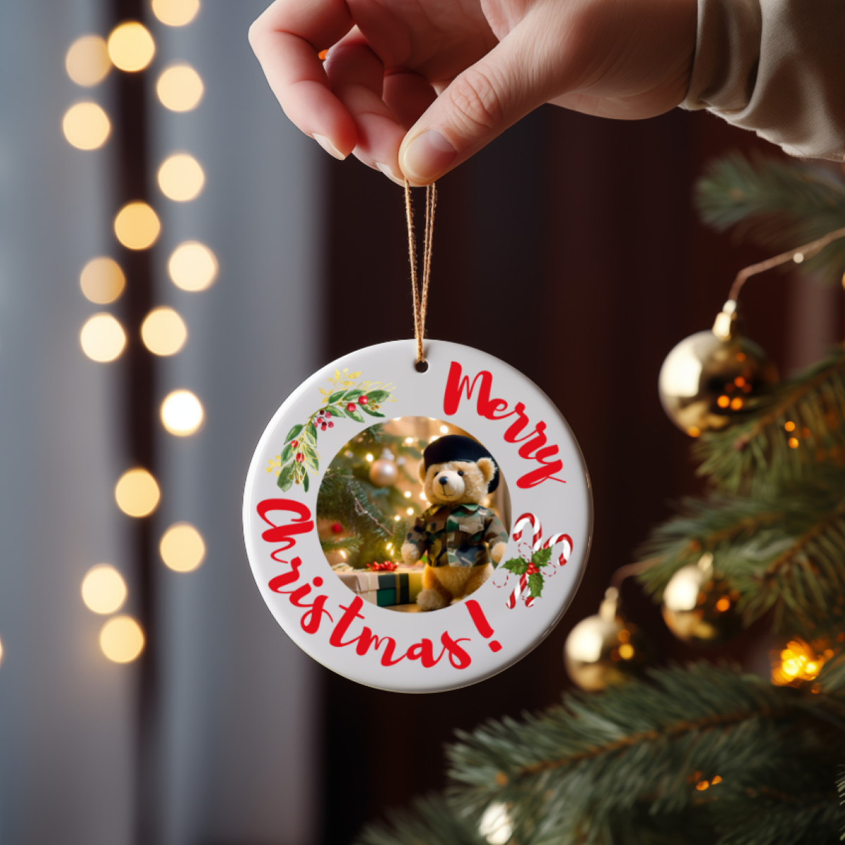 Round ceramic Christmas ornament or gift with military bear, candy cane, and mistletoe on a Christmas tree for army family
