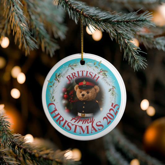 British Army Christmas ornament 2025 featuring teddy bear in formal dress uniform with festive wreath and gold string.