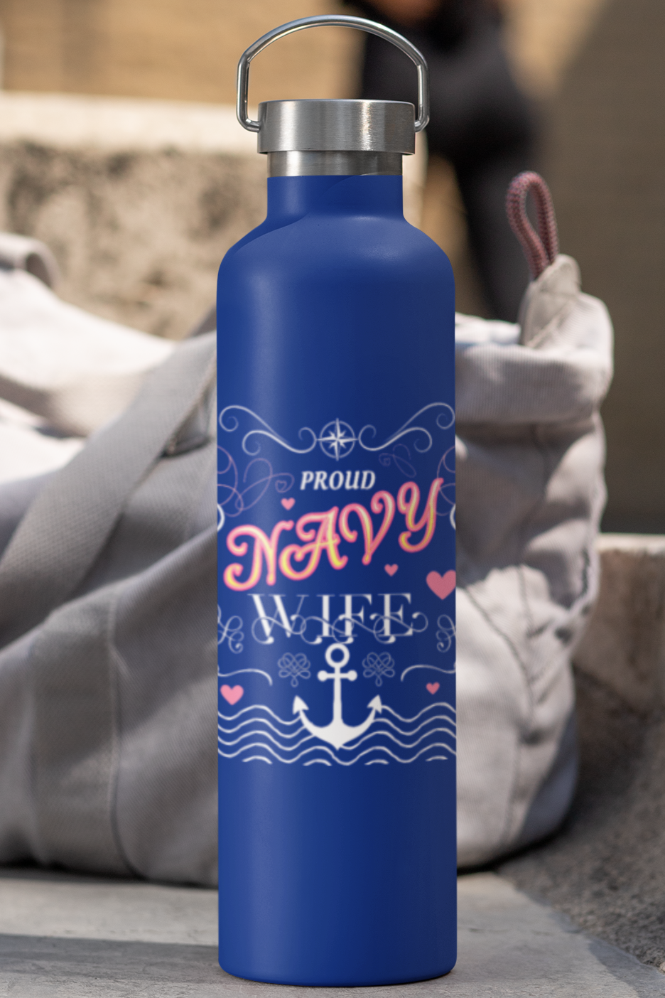 Proud Navy Wife water bottle in navy blue, 22oz insulated stainless steel with custom design.