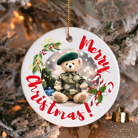 Round ceramic Christmas ornament or gift with military bear, candy cane, and mistletoe on a Christmas tree for Royal Marine family