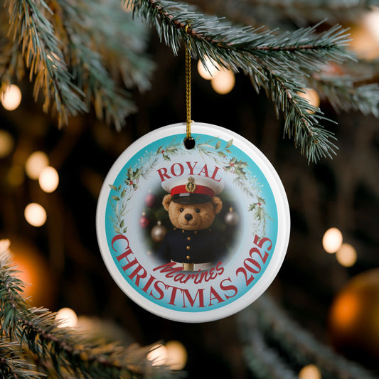 Royal Marines Christmas ornament 2025 featuring teddy bear in  uniform with festive wreath and gold hanging string.