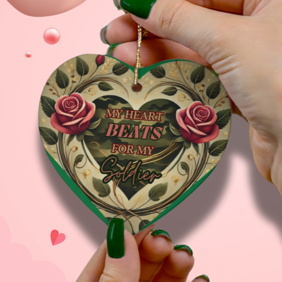 Heart-shaped ceramic ornament with 'My Heart Beats for My Soldier' text, ideal for Army families and romantic holiday decor.